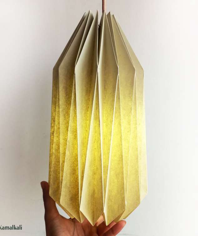 beige-with-hanging-cord-in-hand-1.jpg